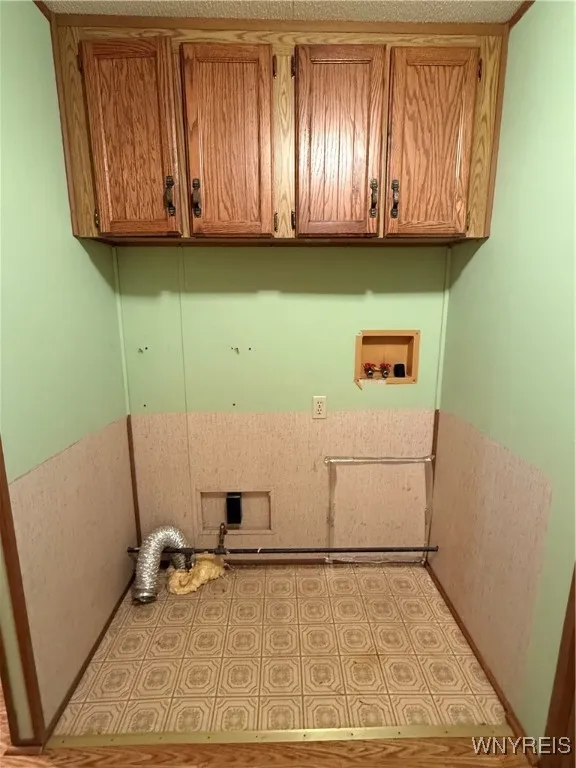 Laundry hookups outside primary bedroom.