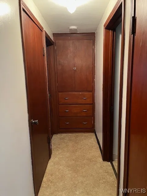 Front unit hallway to Full Bath and first floor bdrm