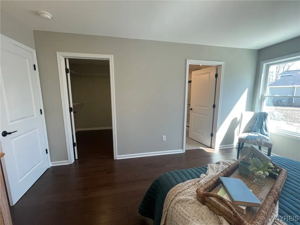 Walk in closet and full bath in the primary bedroom