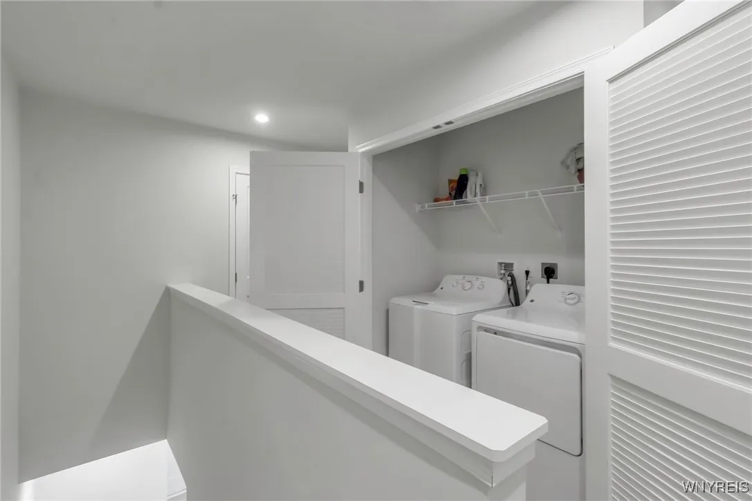 2nd floor laundry - really convenient!  These doors close to preserve the look of the upstairs.