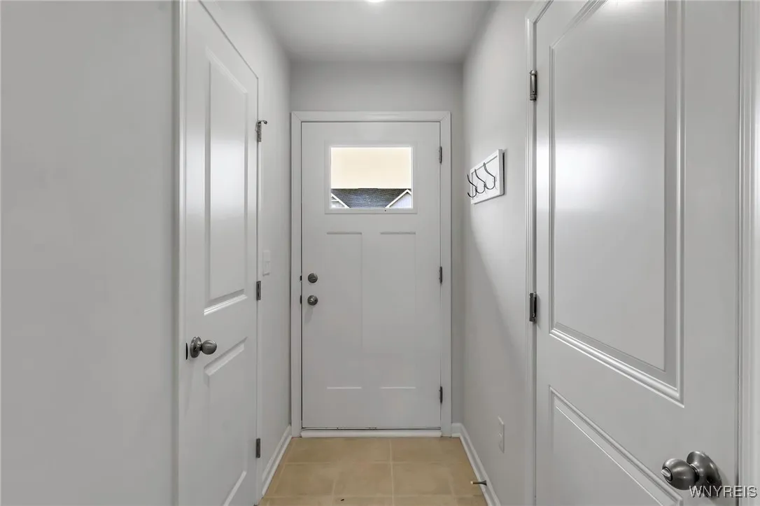 Front entrance - 1/2 bath on left and garage entrance on the right