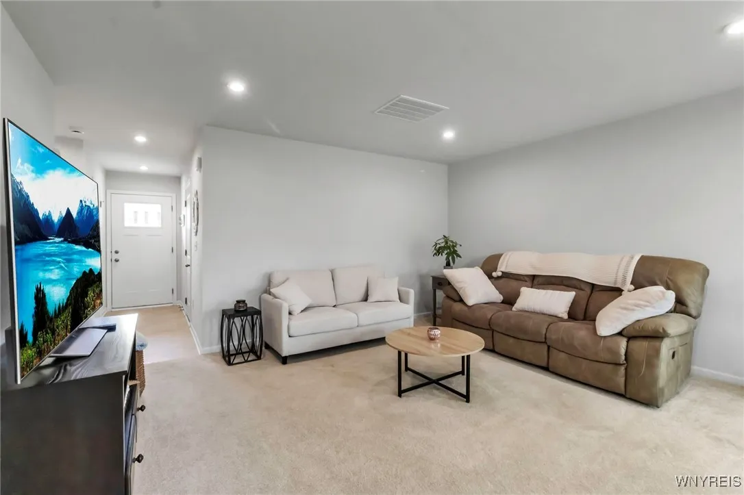 Great room for TV viewing! TV can go on a stand as shown or on any of the three walls.