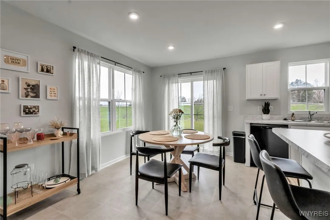 Plenty of light comes in to the kitchen and dining area!