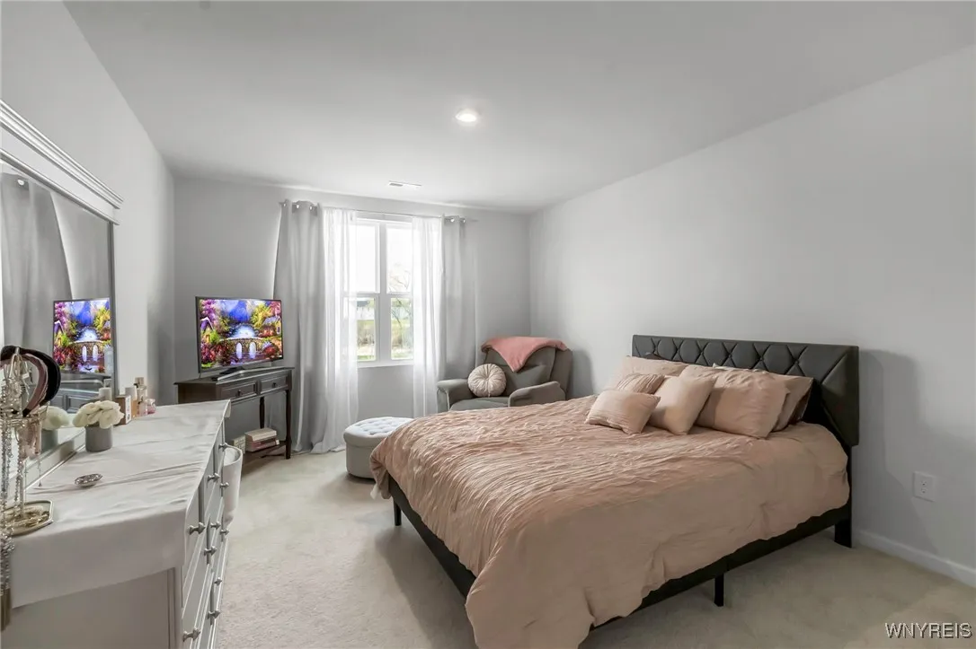 Primary bedroom has a lot of room in it!