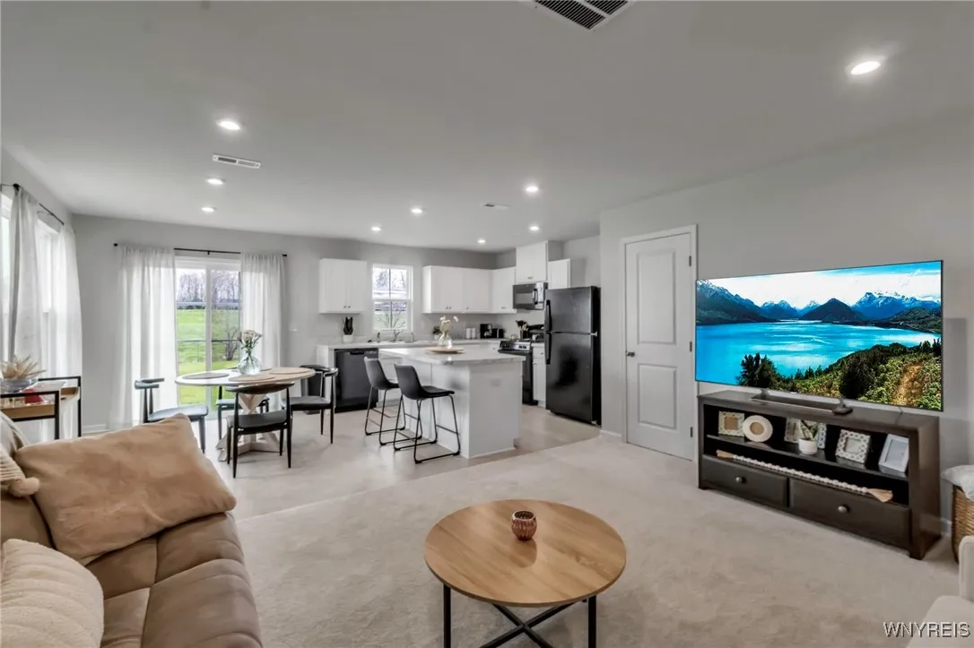 Nice shot of the open floor plan from the sofa area!