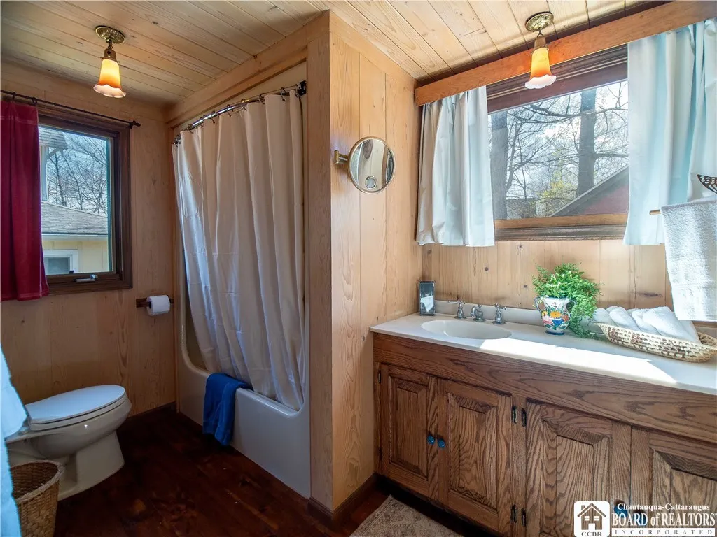 The full bath on the first floor services the main cottage.