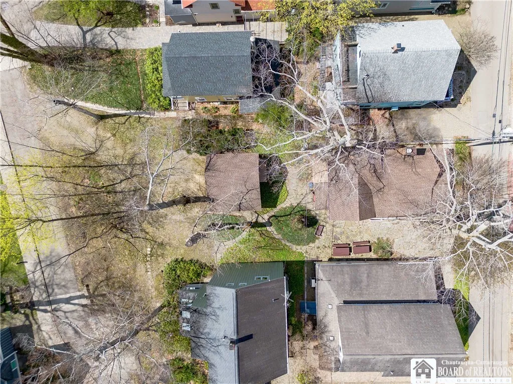 Aerial view of the main cottage and bunkhouse, situated on a double CI lot.