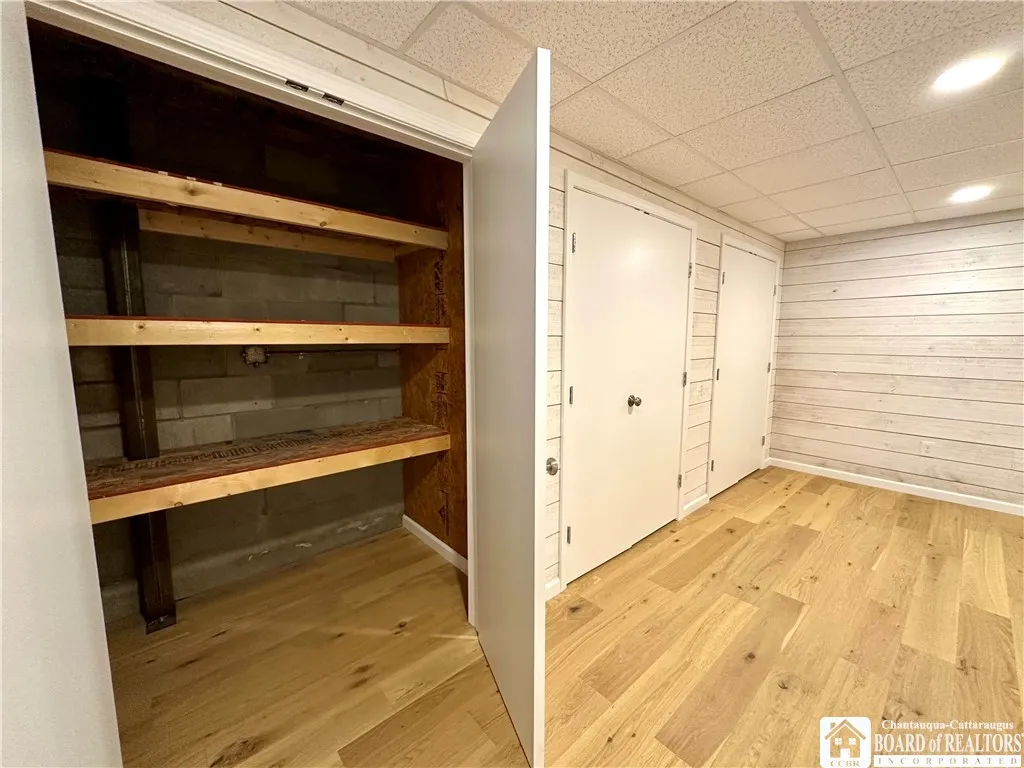 The basement split one side storage the other entertainment