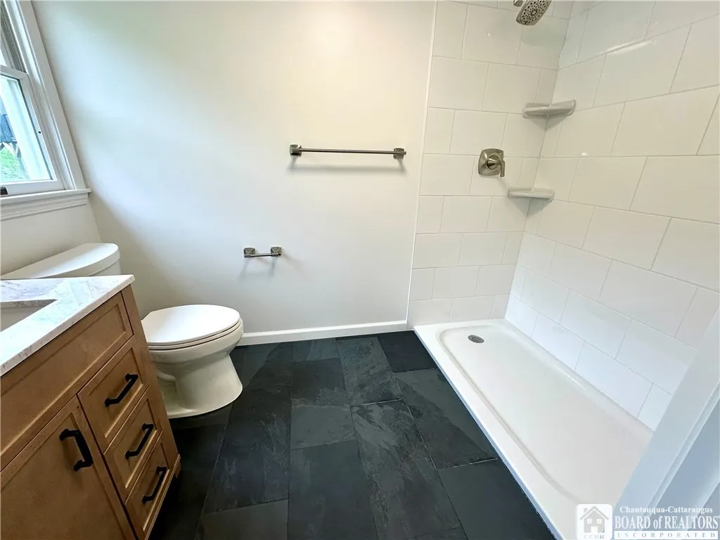 Ensuite Bathroom....glass shower door is on order