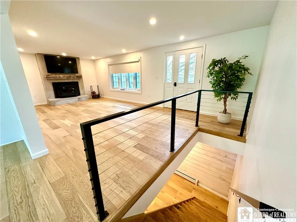 Coming up from the basement into the living room/ dining room area