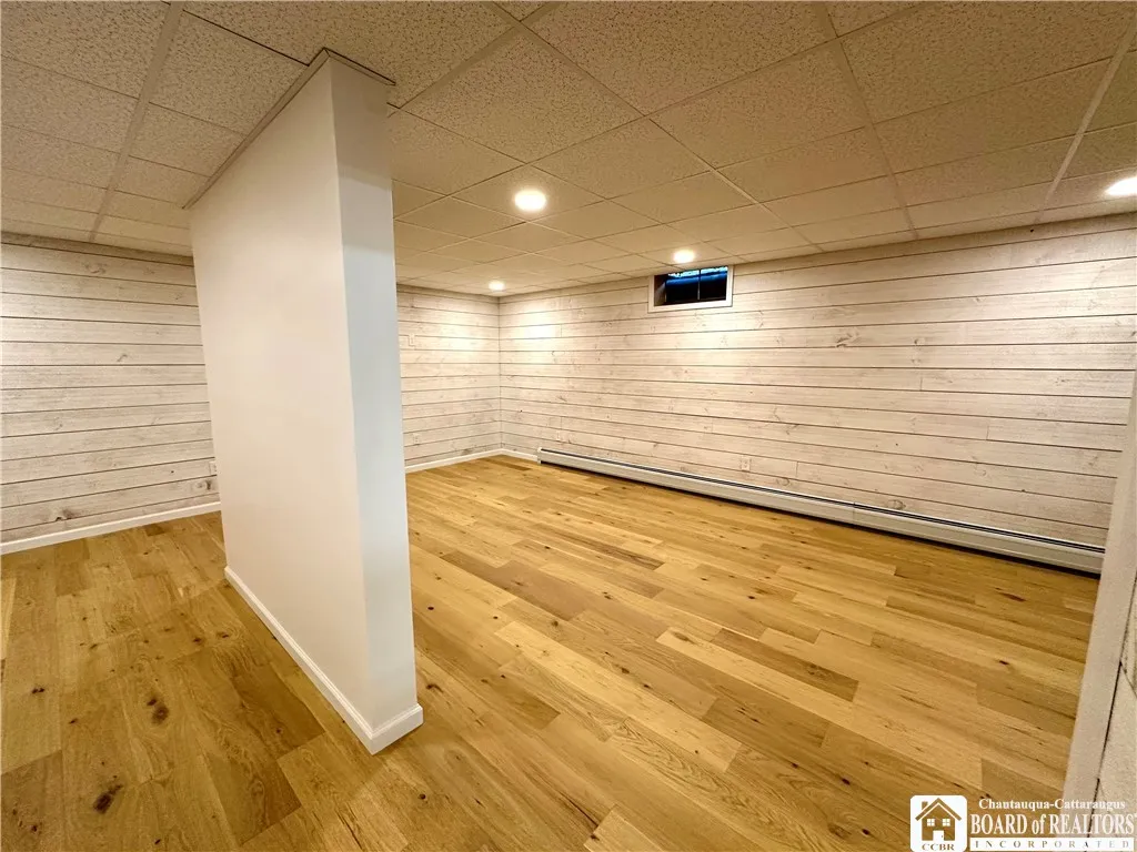 The basement split one side storage the other entertainment