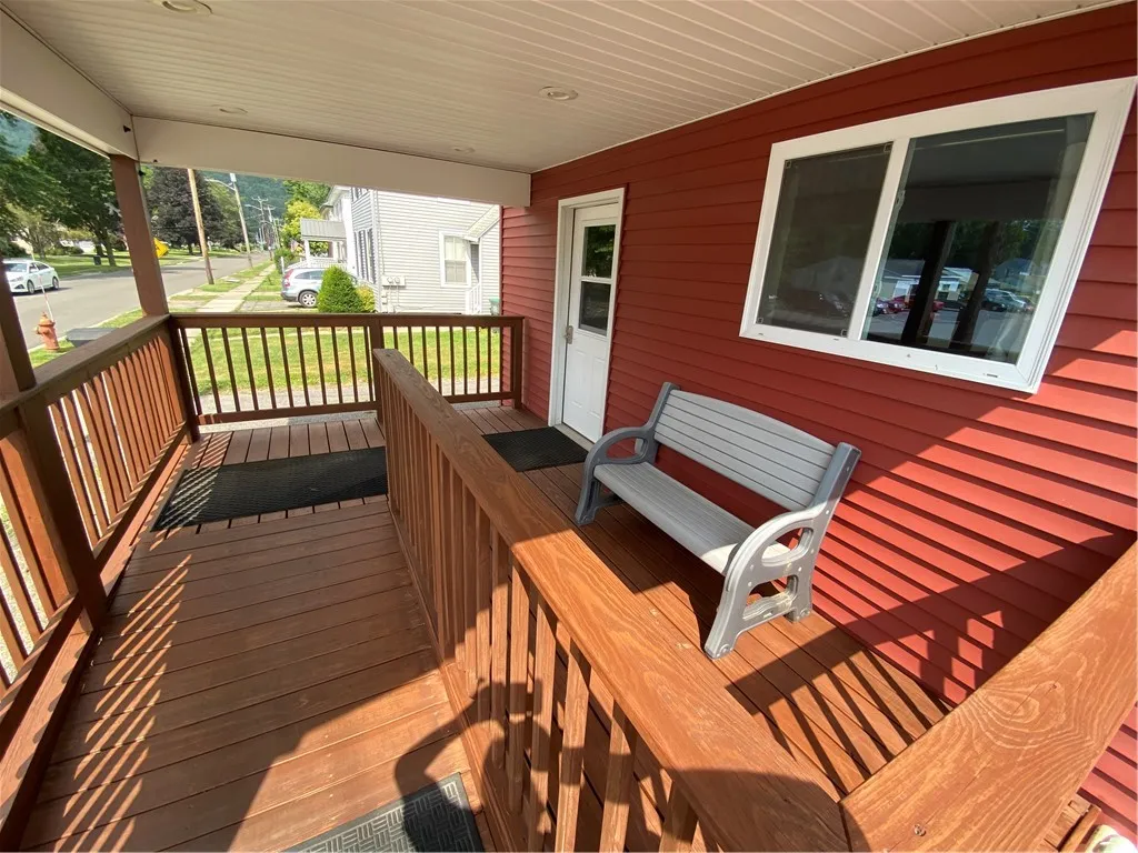 Newly stained front porch
