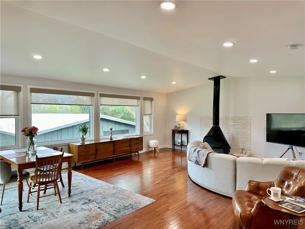 The great room has lots of versatility- living room & dining room space can adapt to your style & needs