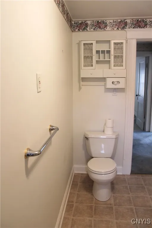 Upstairs bath with full tub.