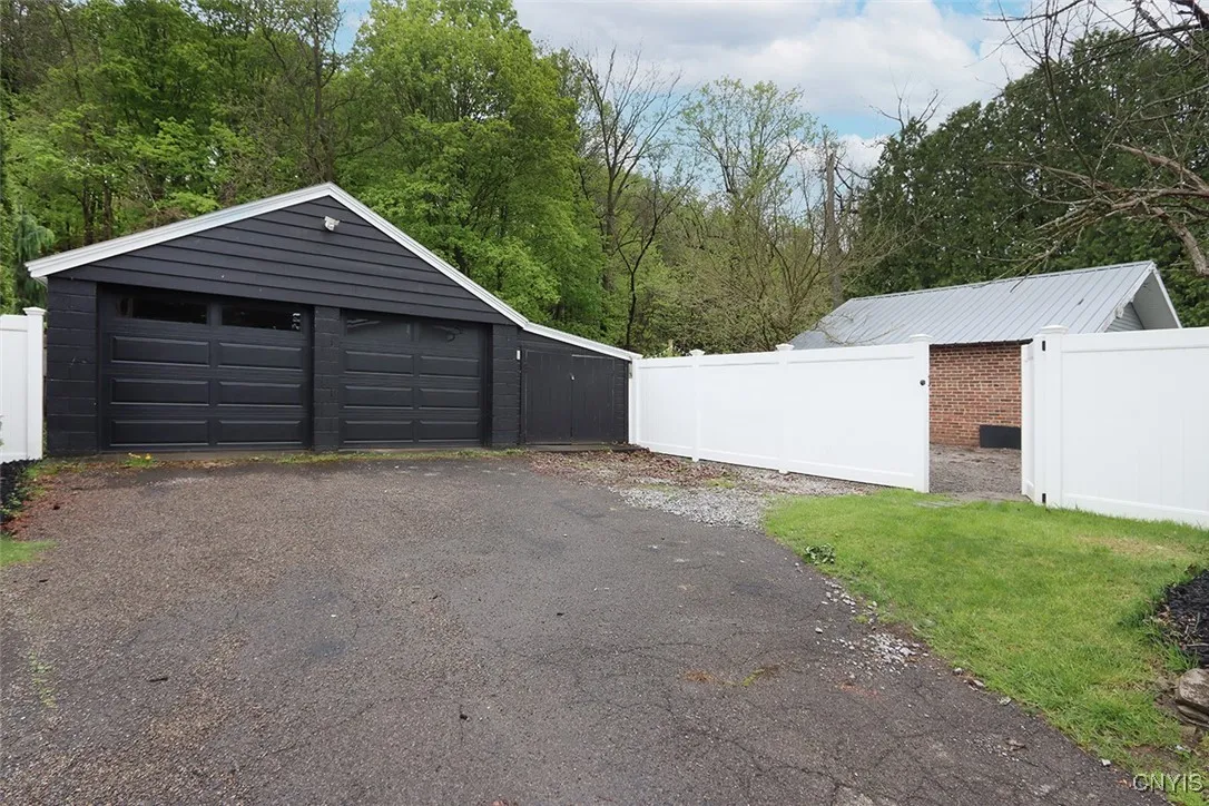New garage doors.  Attached shed to garage.