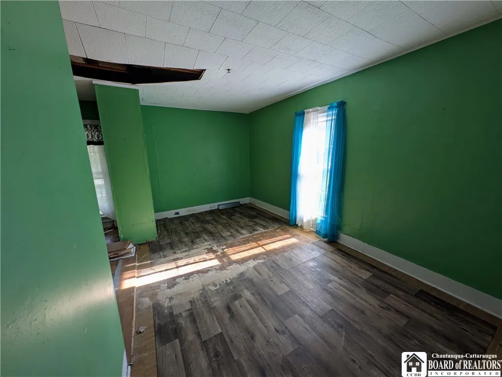 Room off living room-Den/office?