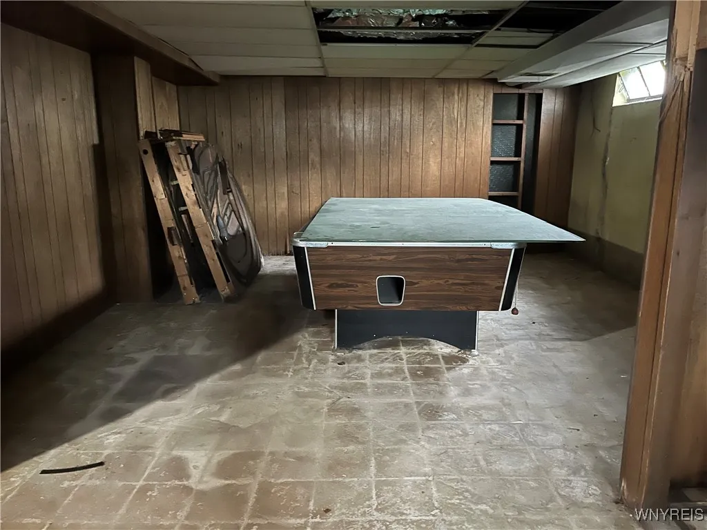 Pool table in basement stays
