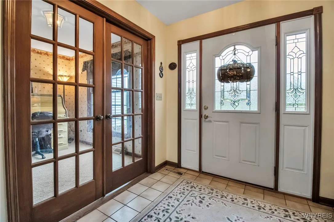 Foyer w/French doors to Office/den