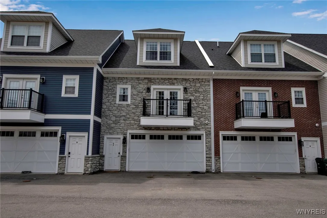 Back of unit with Garage and Balcony