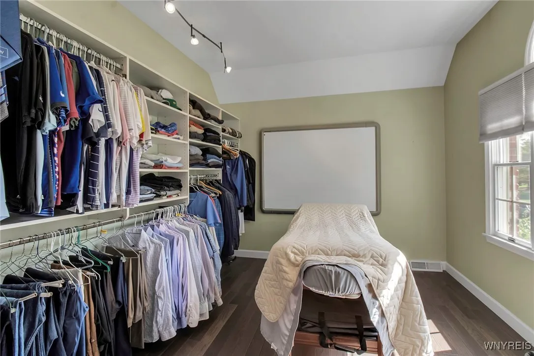 Primary Bedroom Suite with ensuite baths & dual walk-in closets