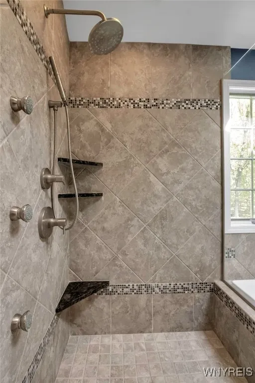 Primary Bedroom Suite with ensuite baths & dual walk-in closets