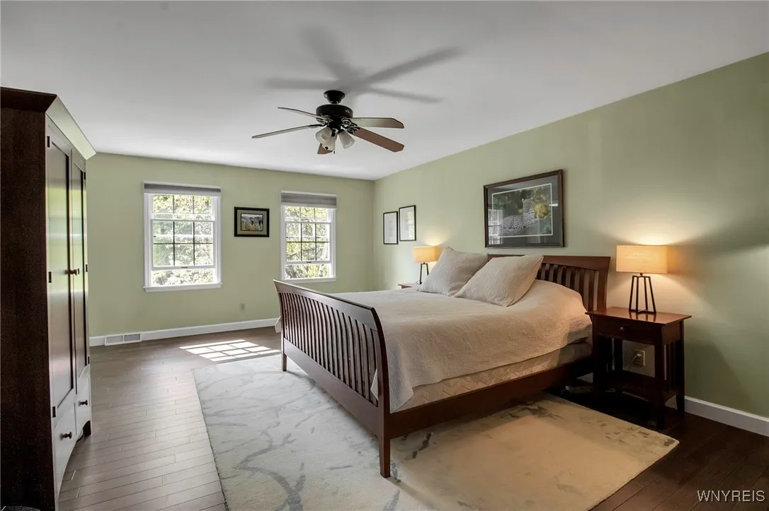 Primary Bedroom Suite with ensuite baths & dual walk-in closets