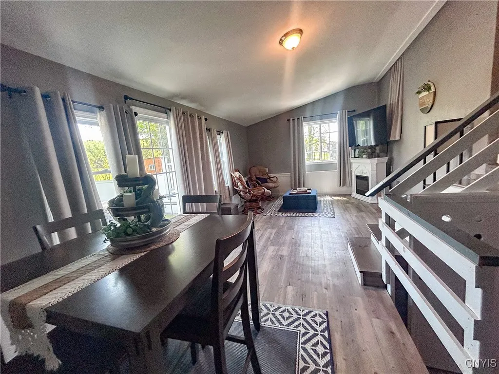 Bonus room with access to back deck.  Primary bedroom access to the right.