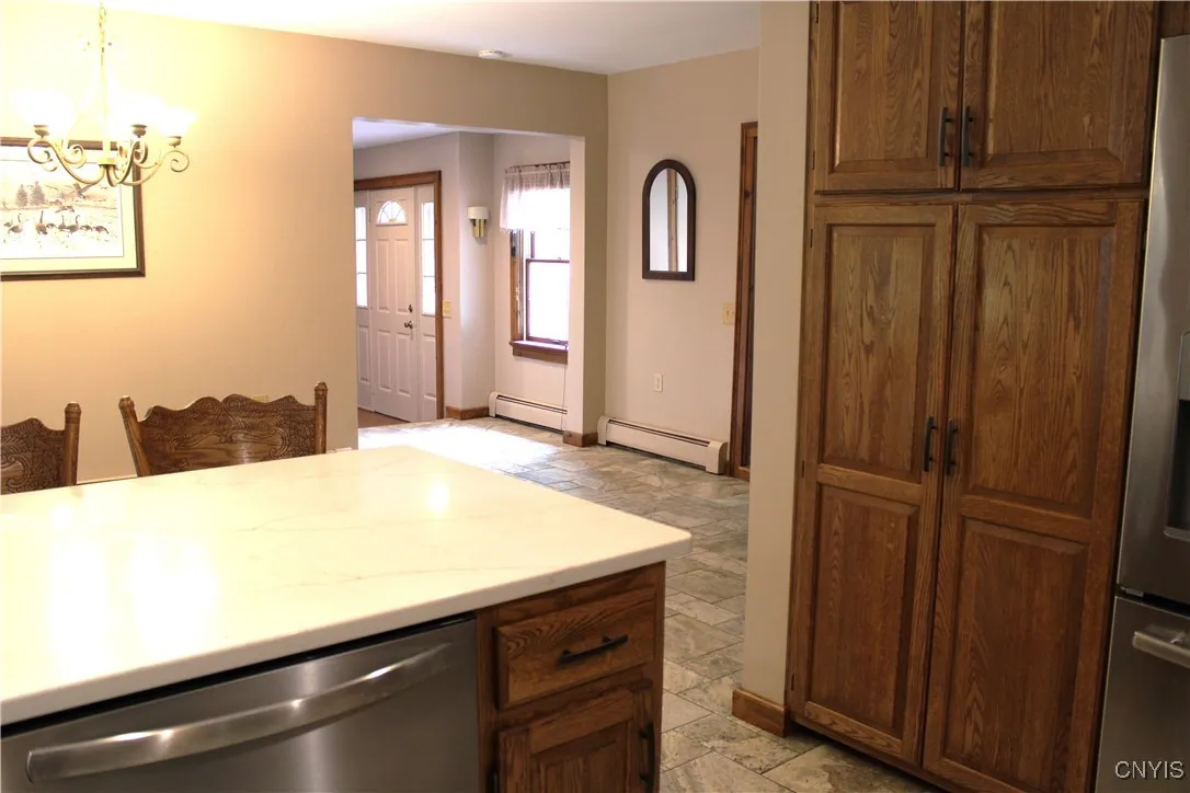 view from breakfast bar to front entryway