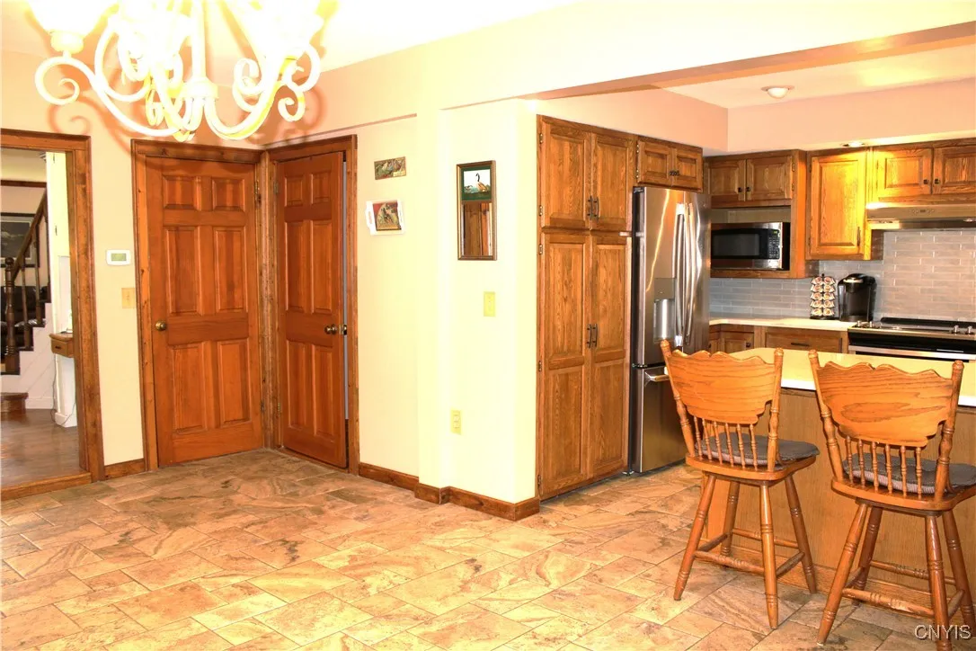 door on right to half bath and laundry