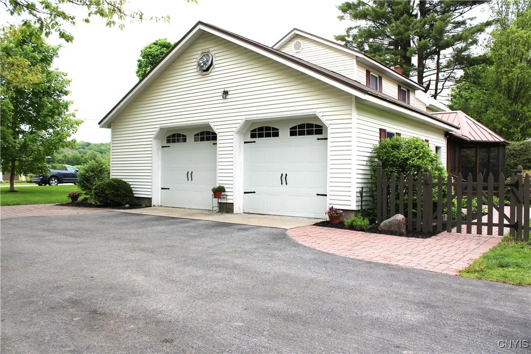 Gate from walkway to driveway and garage