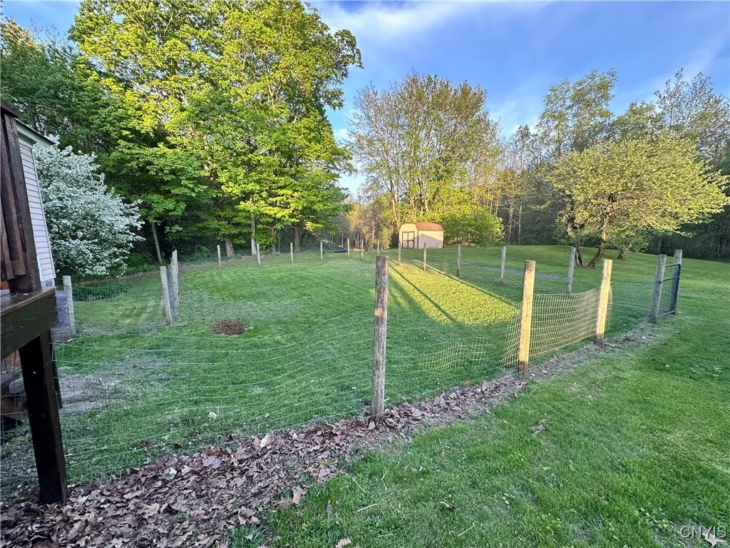 Partially fenced yard.
