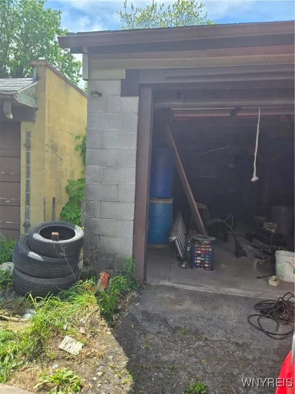Outside the first garage....all items will be removed and the garages  will be broom clean for you to move in your items!!