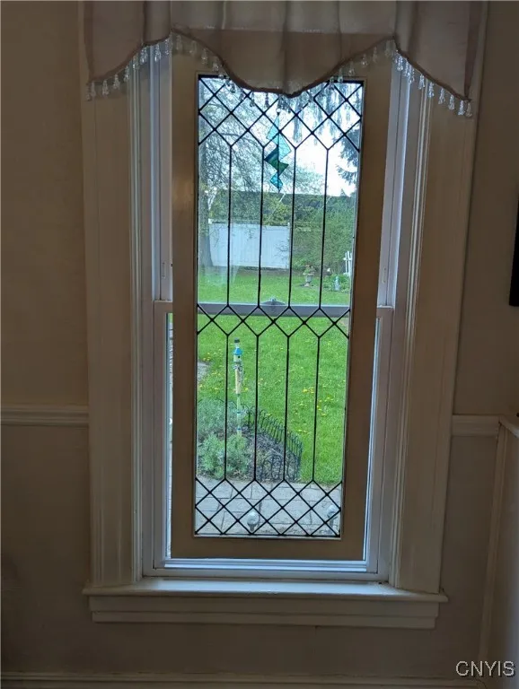 Free hanging letted glass window does not convey with property.