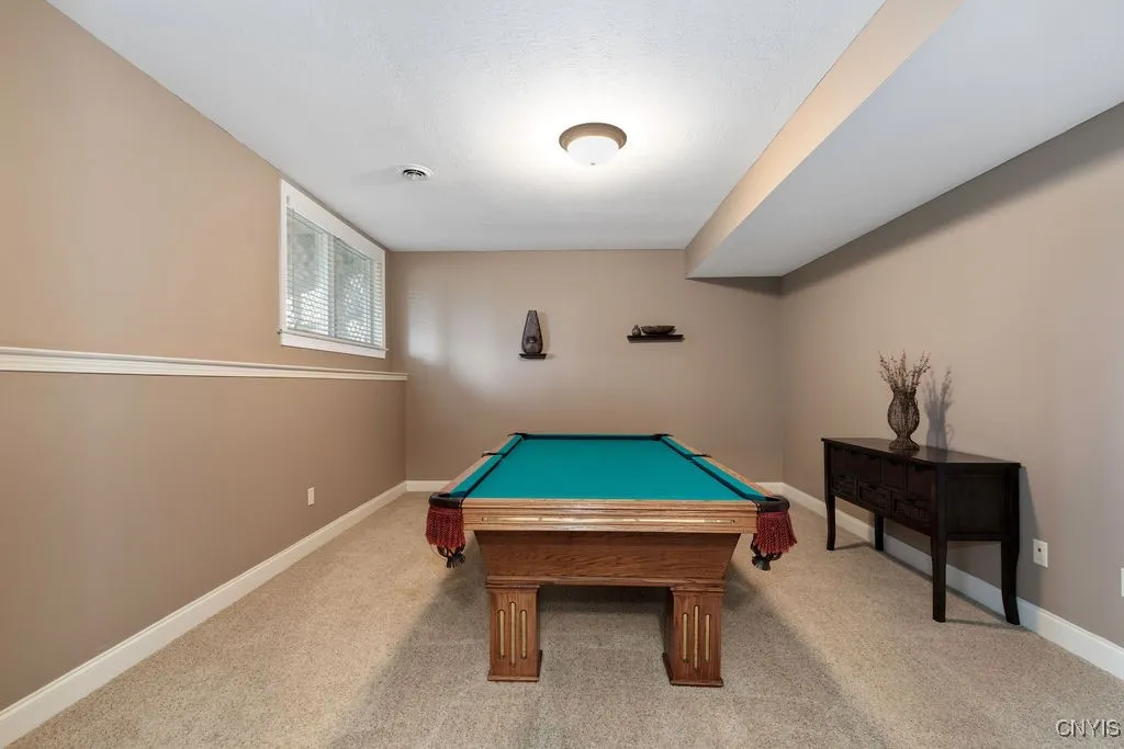 A POOL ROOM, OR THIS ROOM WOULD MAKE A PERFECT MEDIA ROOM, IDEAL FOR MOVIE NIGHT OR THE BIG GAME AS WELL!