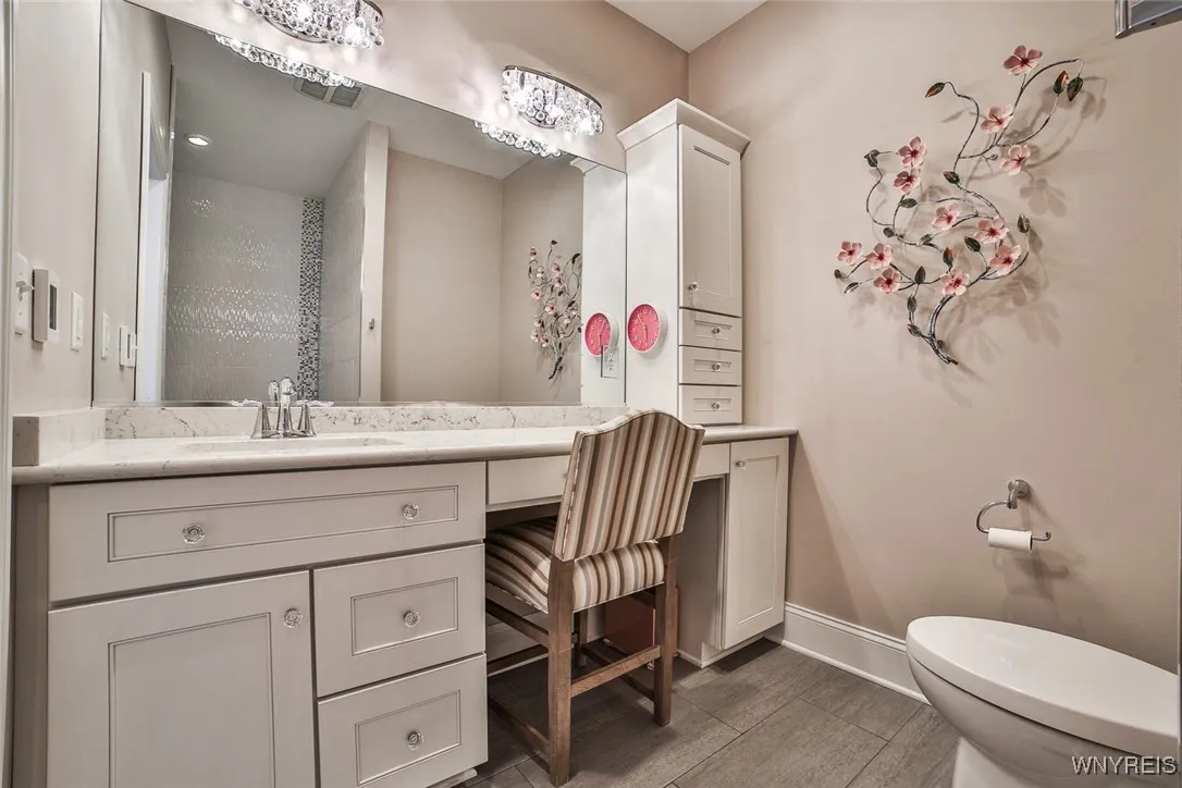 Primary  Bath, Heated Floor,Quartz Vanity top, Added Cabinetry