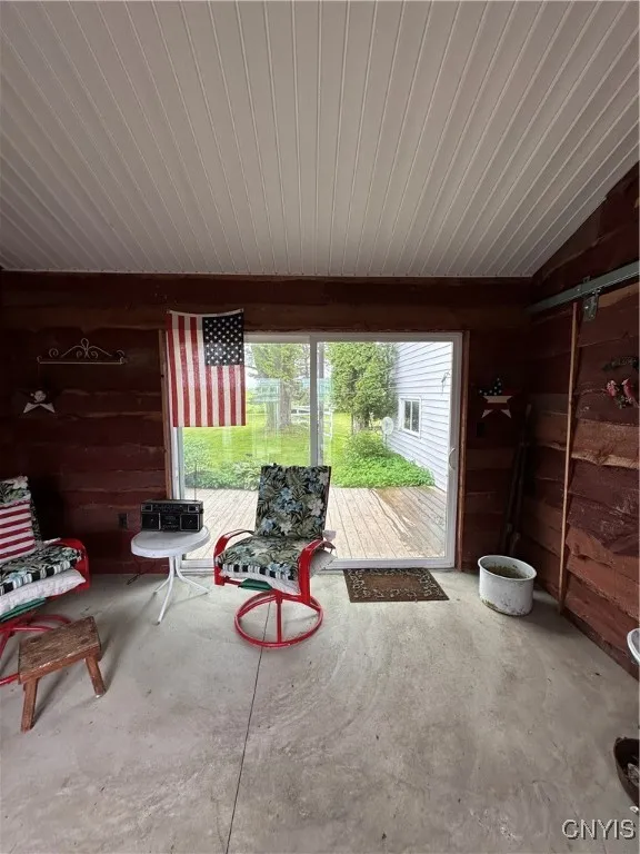 Back deck slider door to yard and extended property