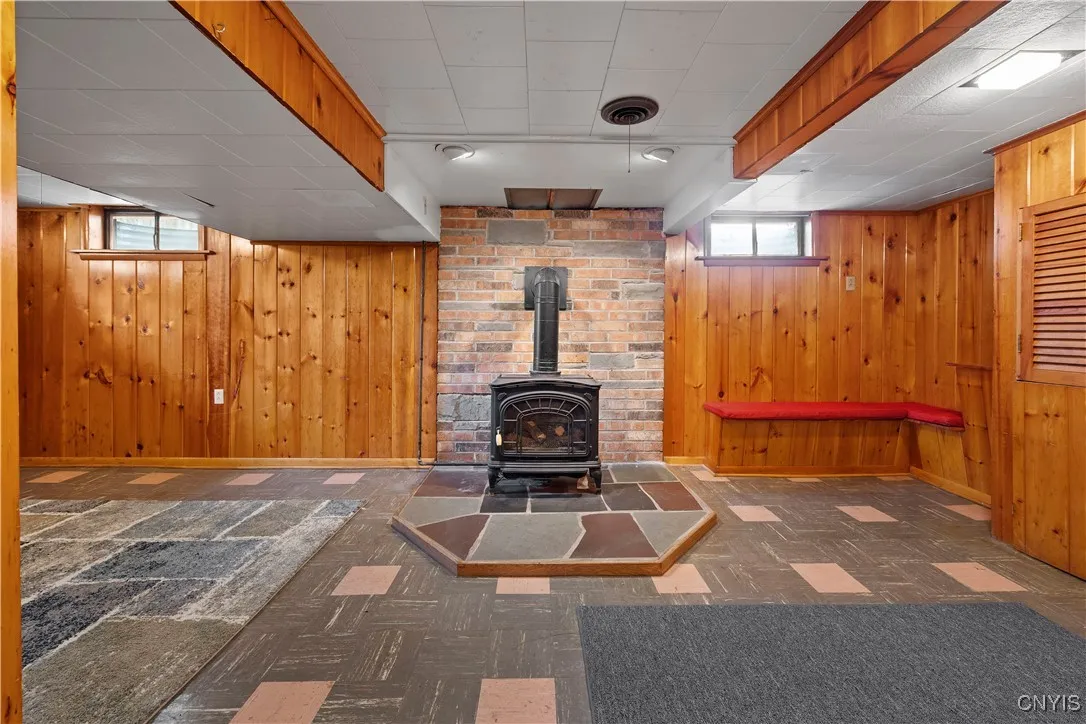 Basement family room with gas fireplace.