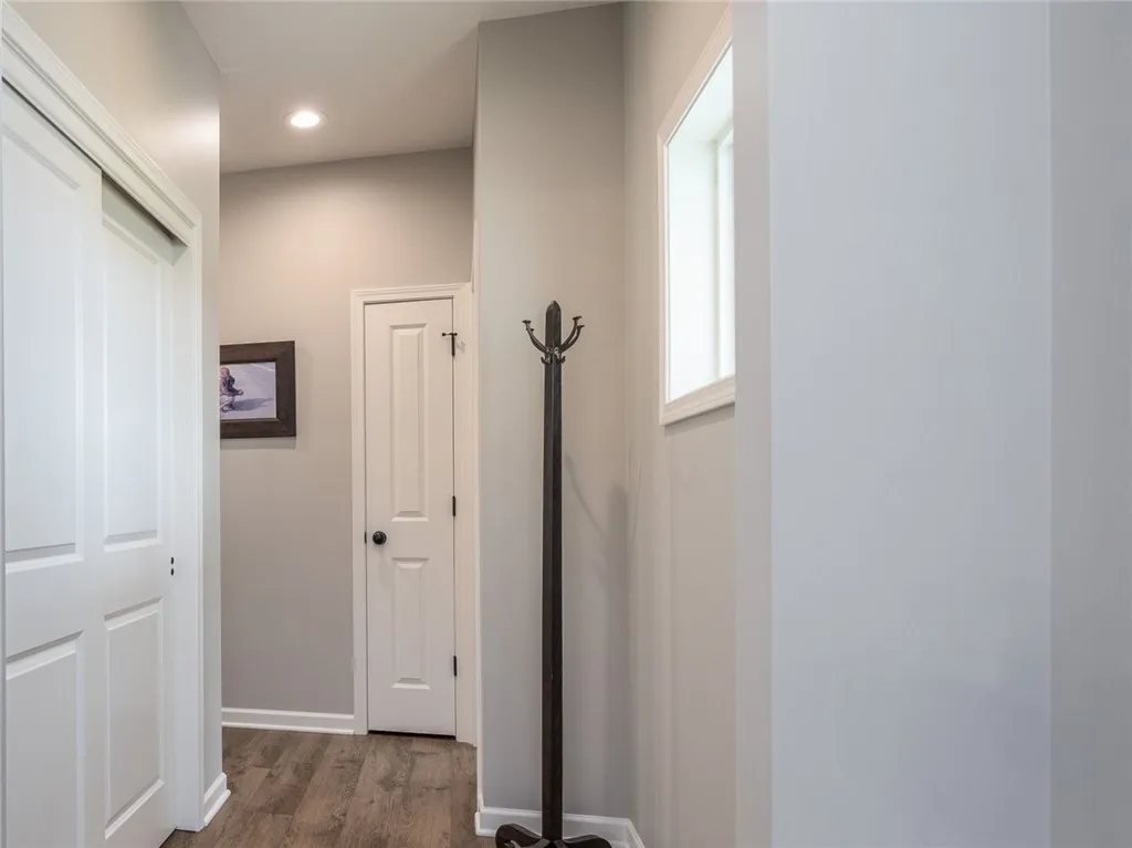 hallway to seperate bedrooms (opposite side of the house from the primary suite)