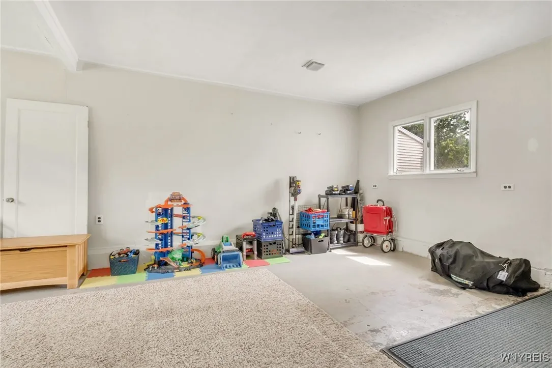 Finished garage space for you to use as an office, movie room, workout room and more!