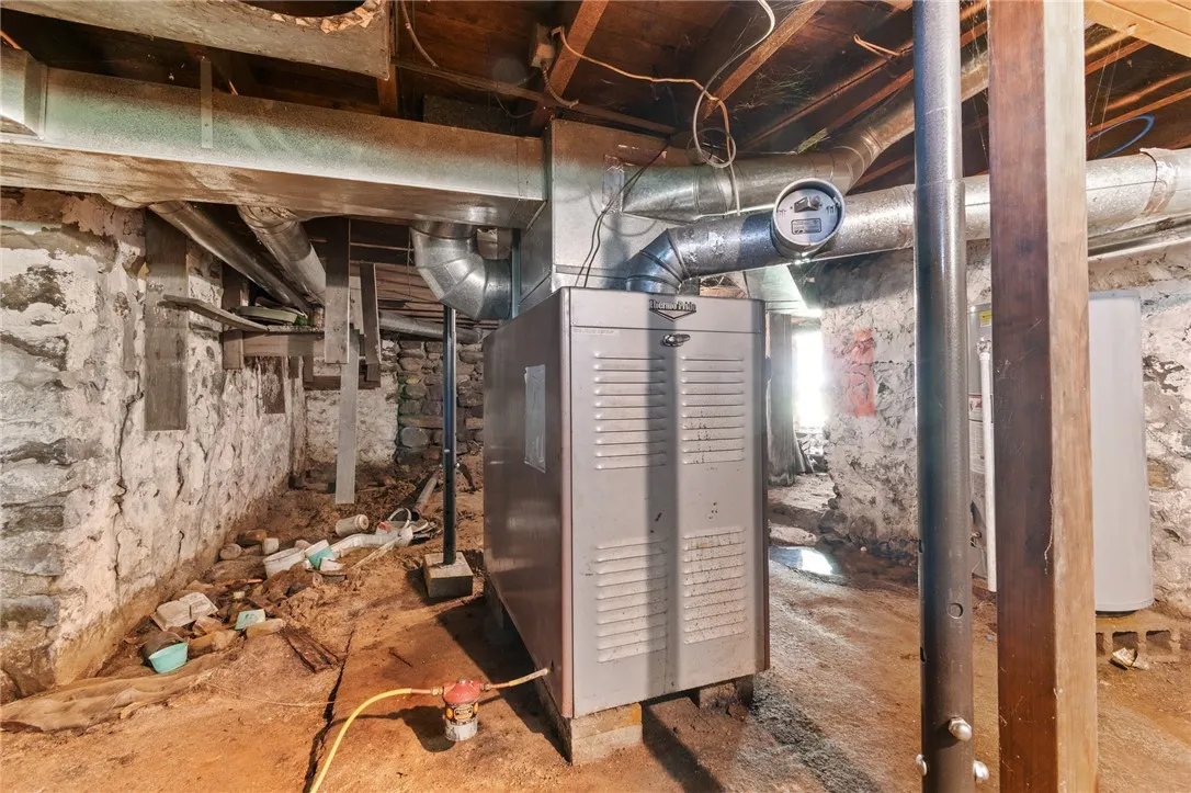 Oil fired furnace - in the outside access basement