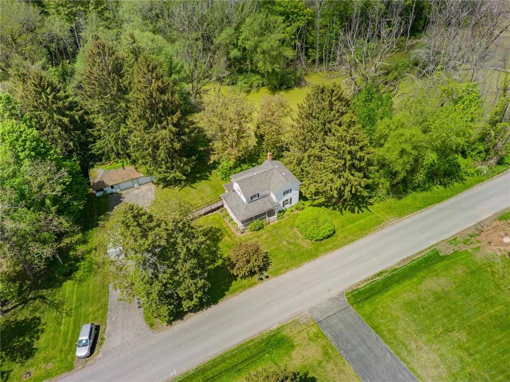 Here’s an overhead view of the property - shows the roof- three bay garage- tun around driveway too!