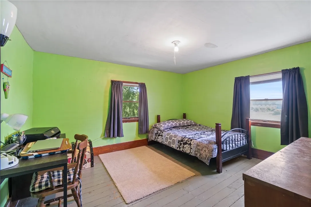 One of the three bedrooms on the second floor