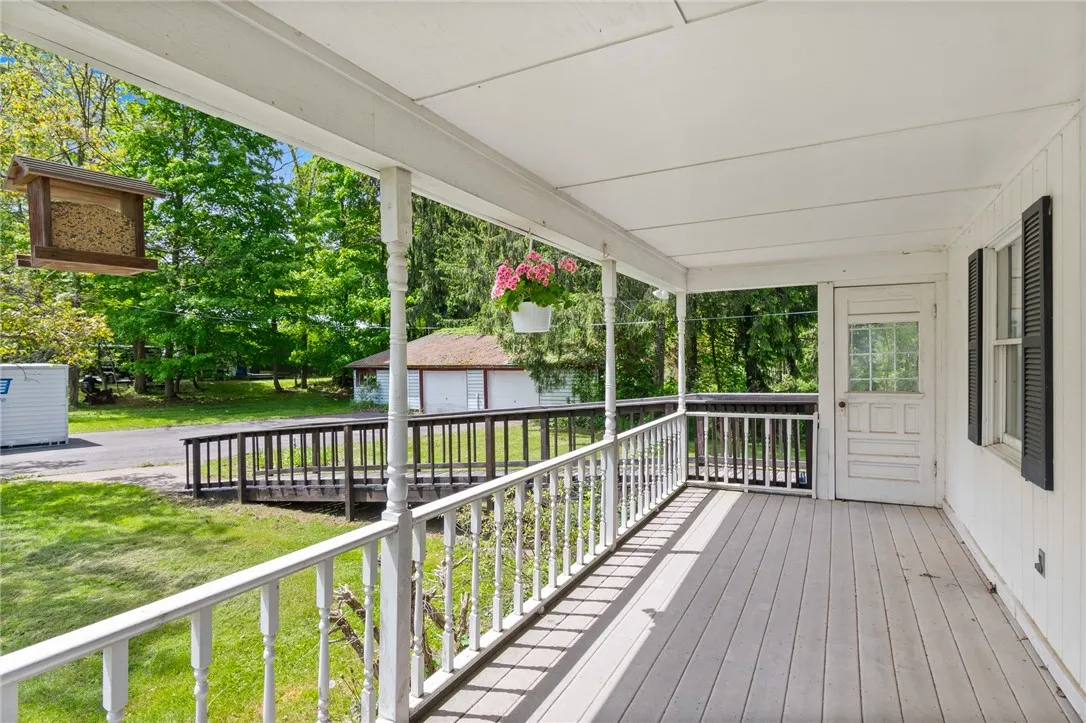 The TREXX style deck is easy care! The porch opens to the house and to the attached mud room
