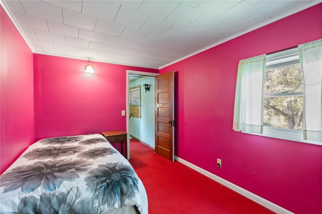 The second of three bedrooms at the top of the stairs