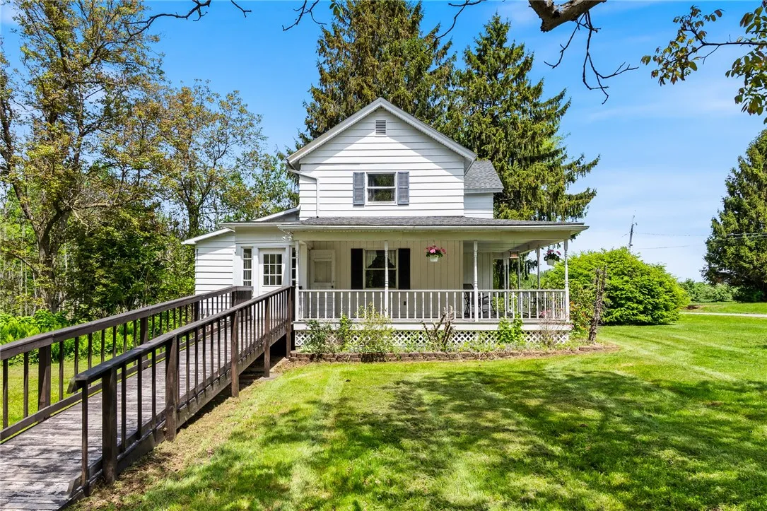 The wrap around porch is the perfect spot to welcome the day! TREXX style decking too!