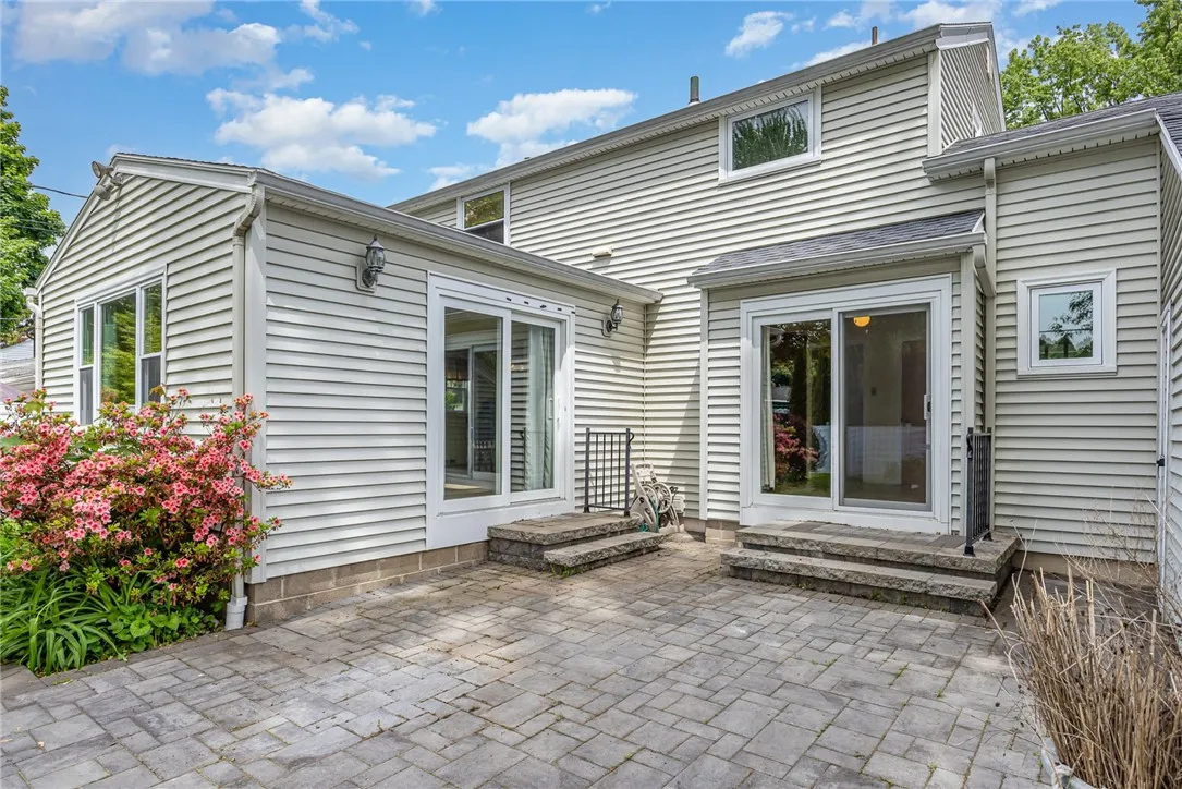Stone block patio is the perfect summertime spot for relaxing and entertaining