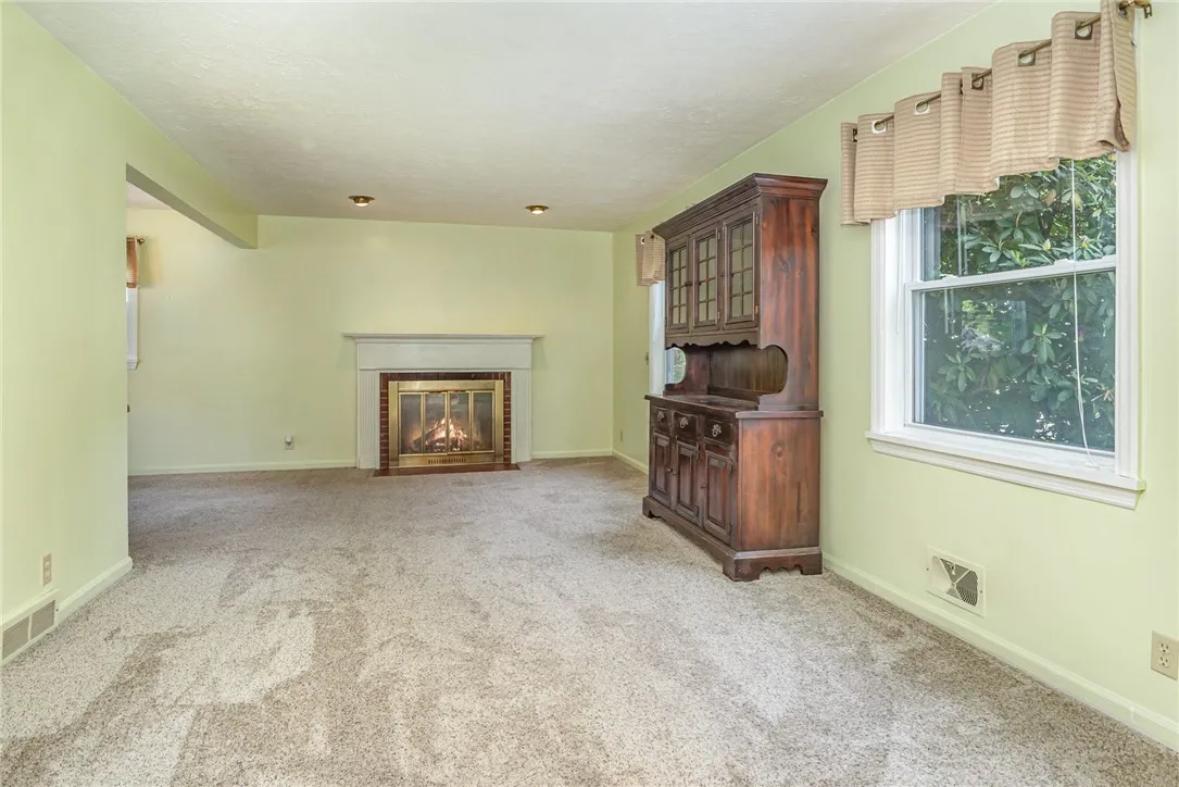 Living Room w/ woodburning fireplace