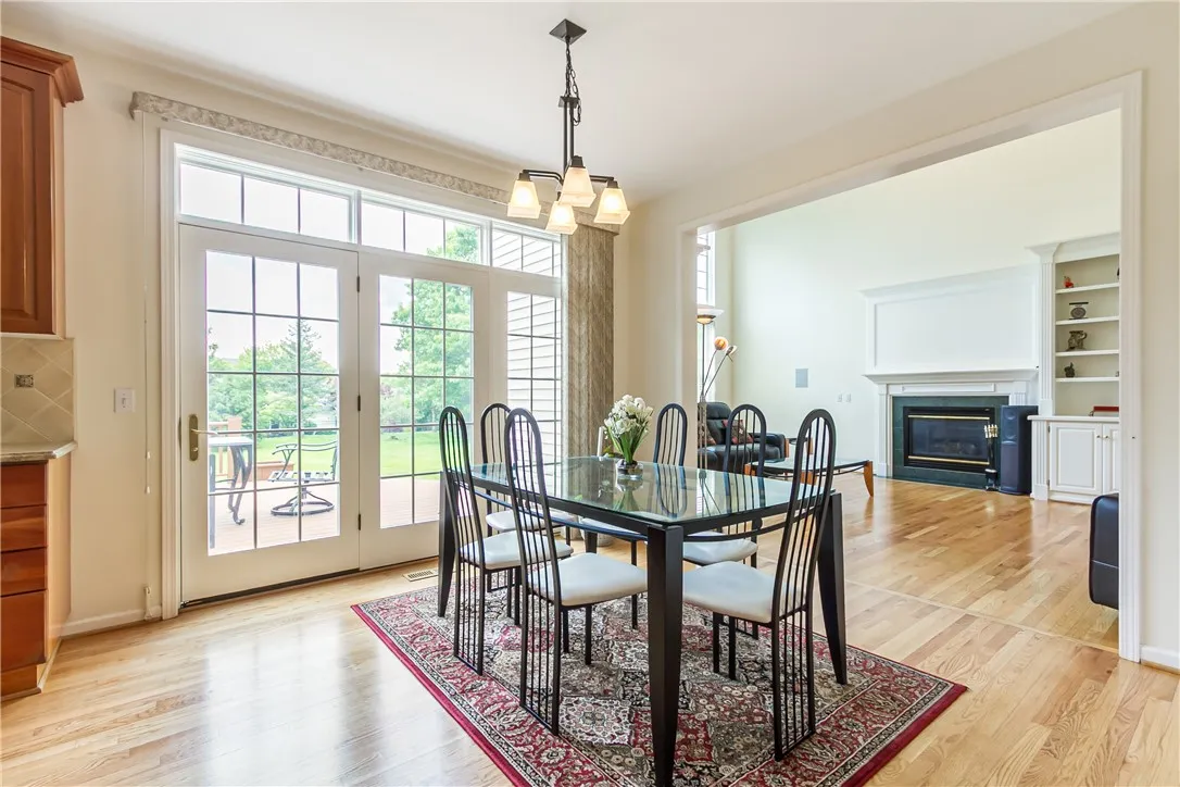 OPEN TO DESIGNER COOK\'S KITCHEN WITH DINING AREA &......... ACCESS TO ENTERTAINMENT SIZED DECK!