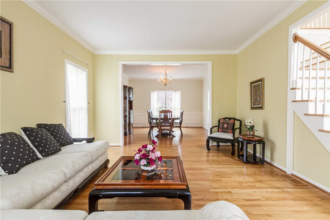 SPACIOUS LIVING ROOM OPEN TO ENTERTAINMENT SIZE DINING ROOM!
