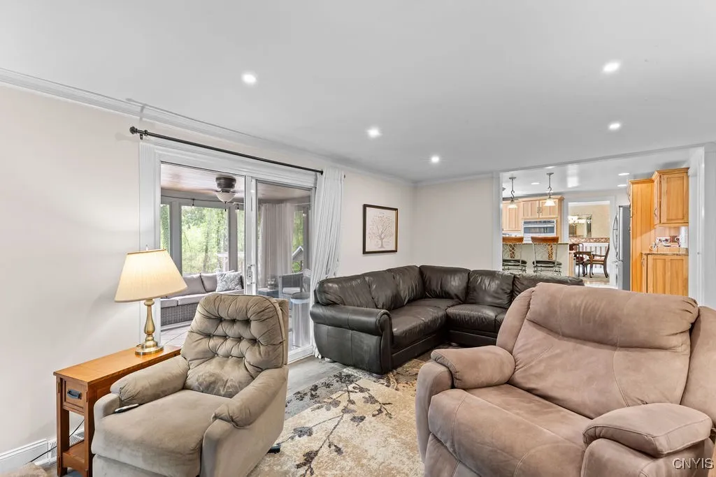 Family room leads to 3 season room